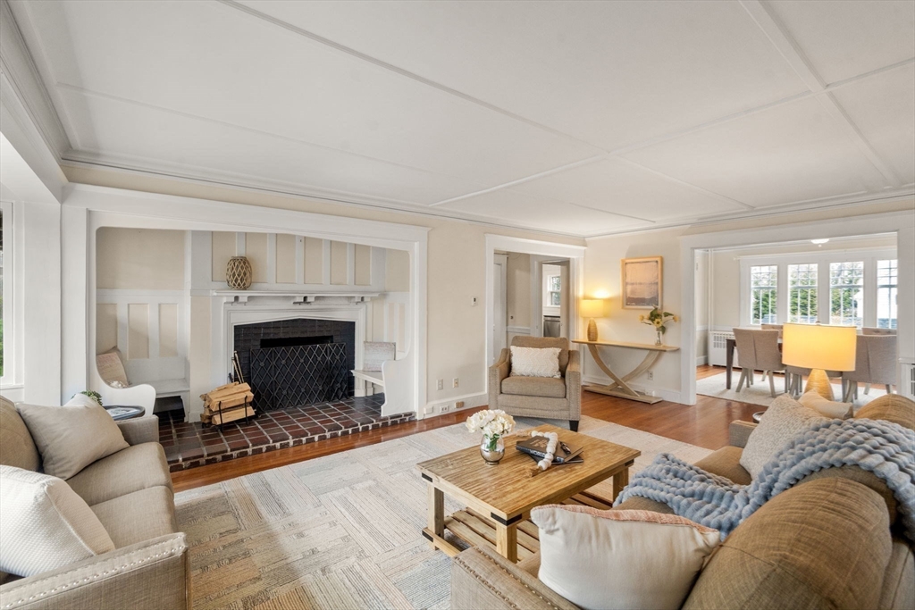 12 Leighton Road Wellesley, MA 02482 - Photo 10 of 34 a living room with furniture and a fireplace
