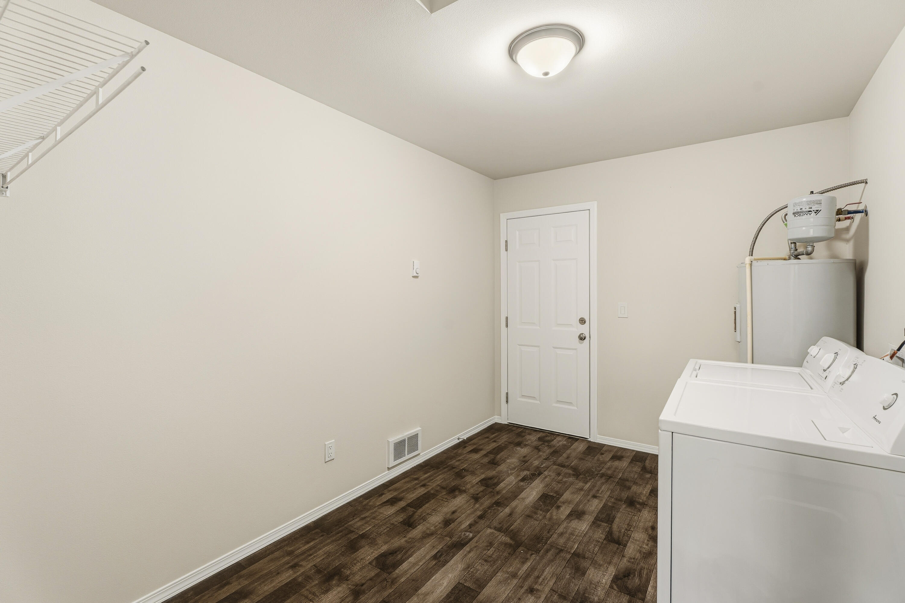 16050 Dick Road La Pine, OR 97739 - Photo 39 of 59 a storage room with a washer and dryer