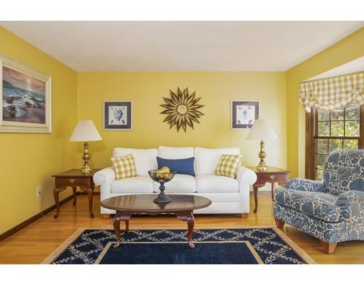 21 Crestview Drive Millis, MA 02054 - Photo 13 of 31 a living room with furniture and a rug