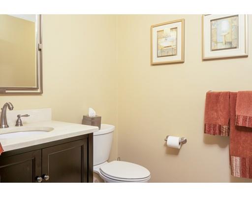 21 Crestview Drive Millis, MA 02054 - Photo 15 of 31 a bathroom with a sink mirror vanity and toilet