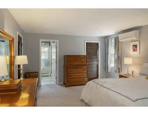 21 Crestview Drive Millis, MA 02054 - Photo 18 of 31 a bedroom with a bed and a dresser