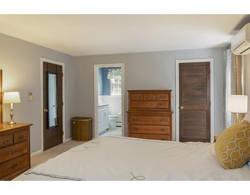 21 Crestview Drive Millis, MA 02054 - Photo 19 of 31 a bedroom with a bed and a dresser