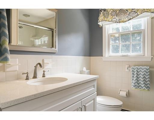 21 Crestview Drive Millis, MA 02054 - Photo 20 of 31 a bathroom with a sink a toilet and mirror