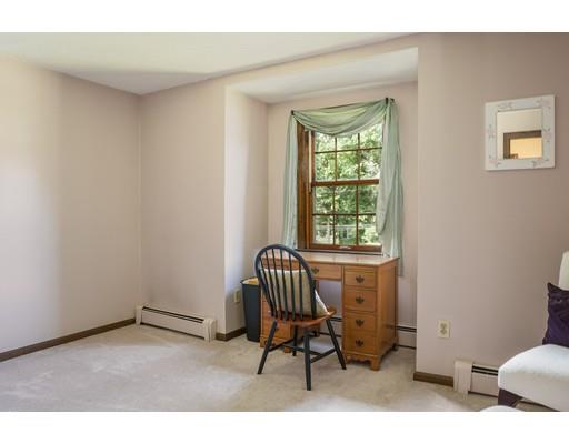 21 Crestview Drive Millis, MA 02054 - Photo 22 of 31 a room with a window and a chair