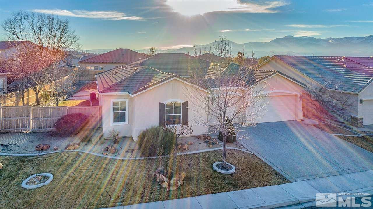 10645 Summer Glen Drive Reno, NV 89521 - Photo 1 of 25 a view of a house with backyard