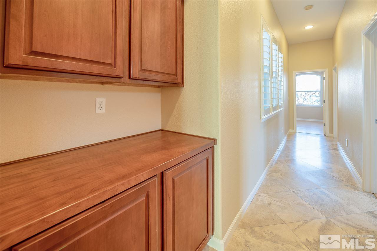 10645 Summer Glen Drive Reno, NV 89521 - Photo 16 of 25 a view of a kitchen with an empty space and a window