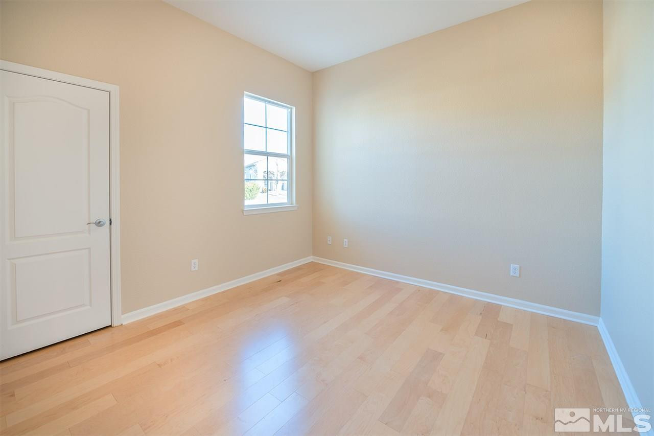 10645 Summer Glen Drive Reno, NV 89521 - Photo 17 of 25 an empty room with a window