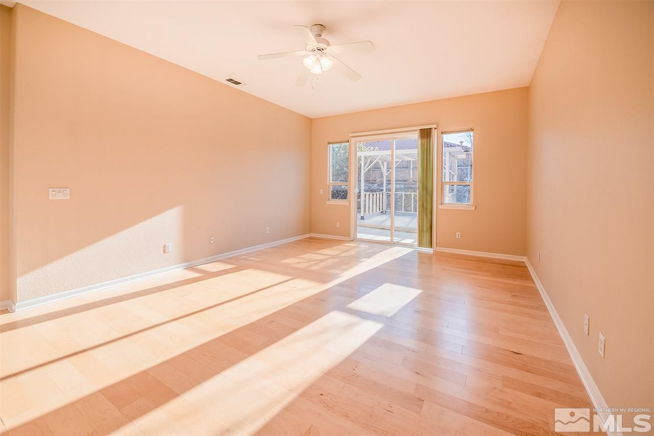 10645 Summer Glen Drive Reno, NV 89521 - Photo 19 of 25 a view of an empty room with a window
