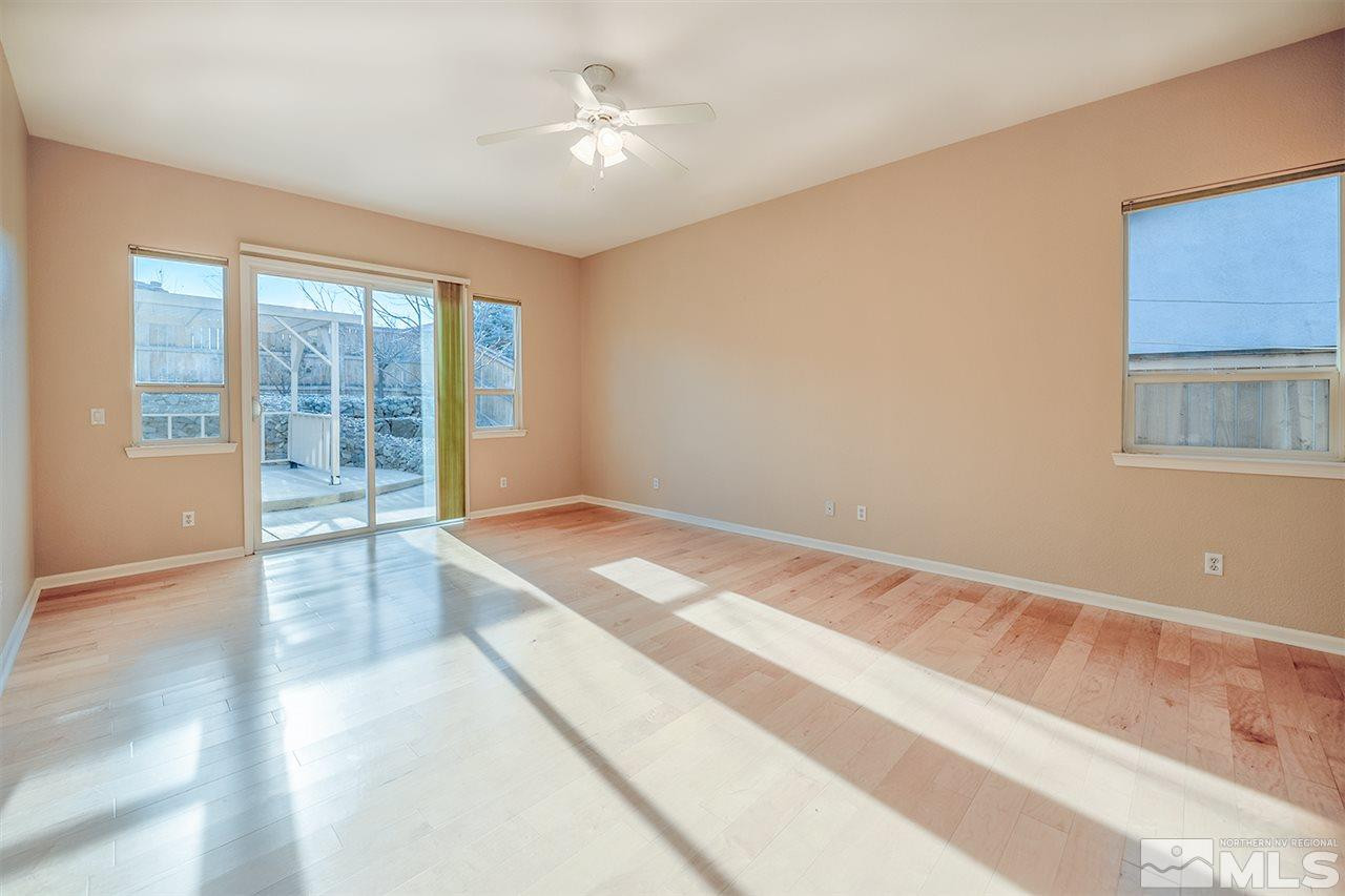10645 Summer Glen Drive Reno, NV 89521 - Photo 20 of 25 a view of an empty room with a window