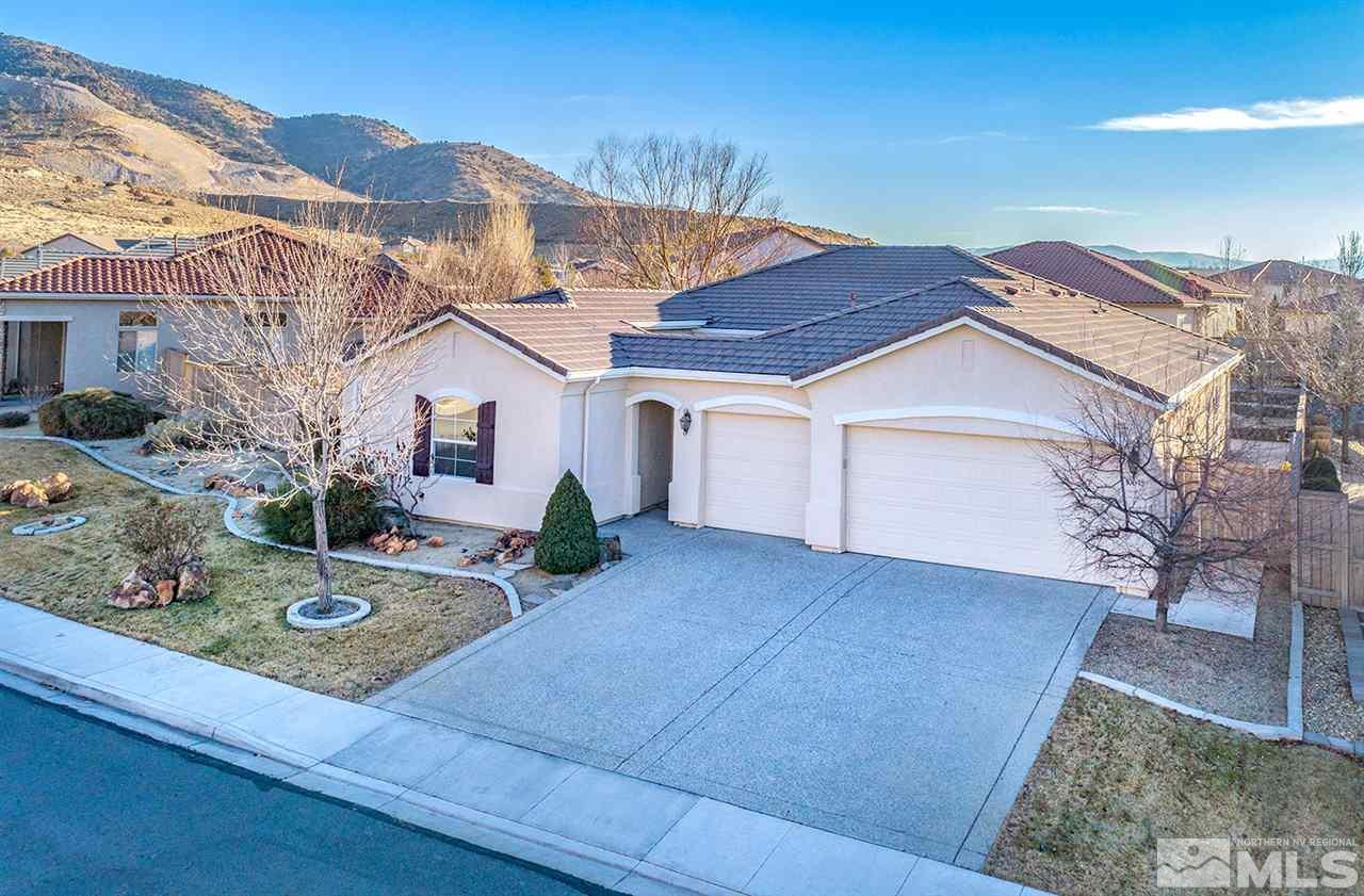 10645 Summer Glen Drive Reno, NV 89521 - Photo 2 of 25 a view of a house with yard and plants