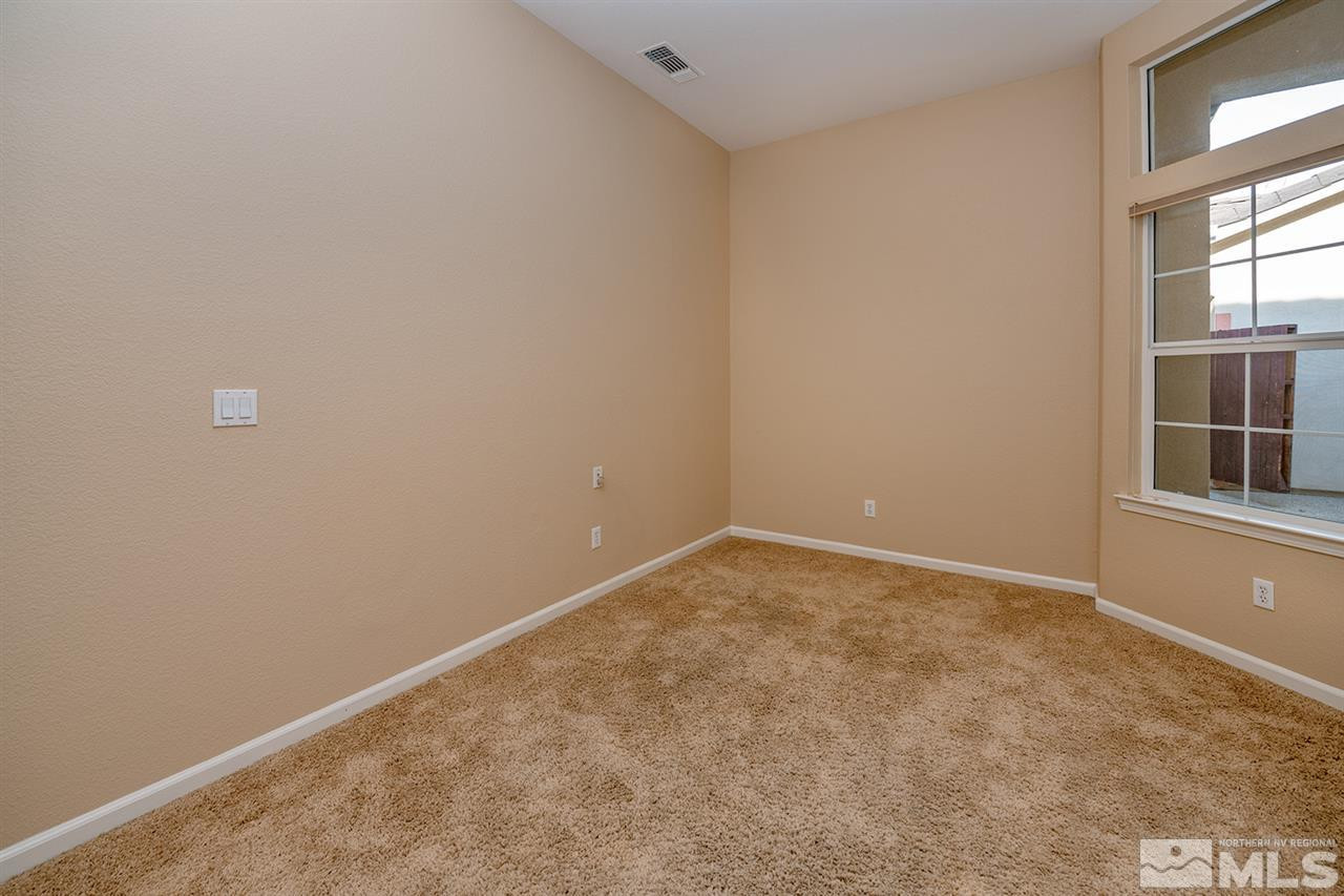 10645 Summer Glen Drive Reno, NV 89521 - Photo 8 of 25 an empty room with a window