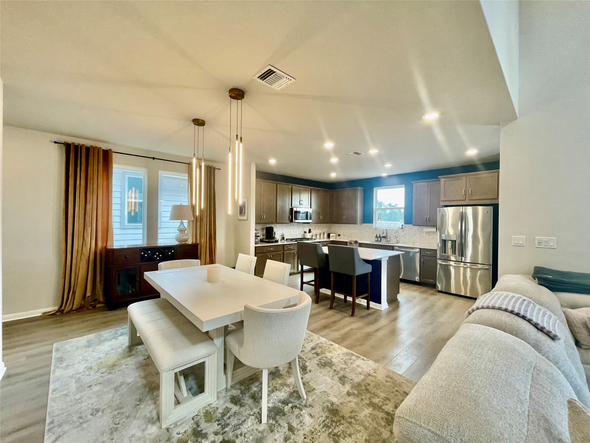 232 Denali Way Dripping Springs, TX 78620 - Photo 11 of 33 Dining room featuring light wood-style floors and recessed lighting