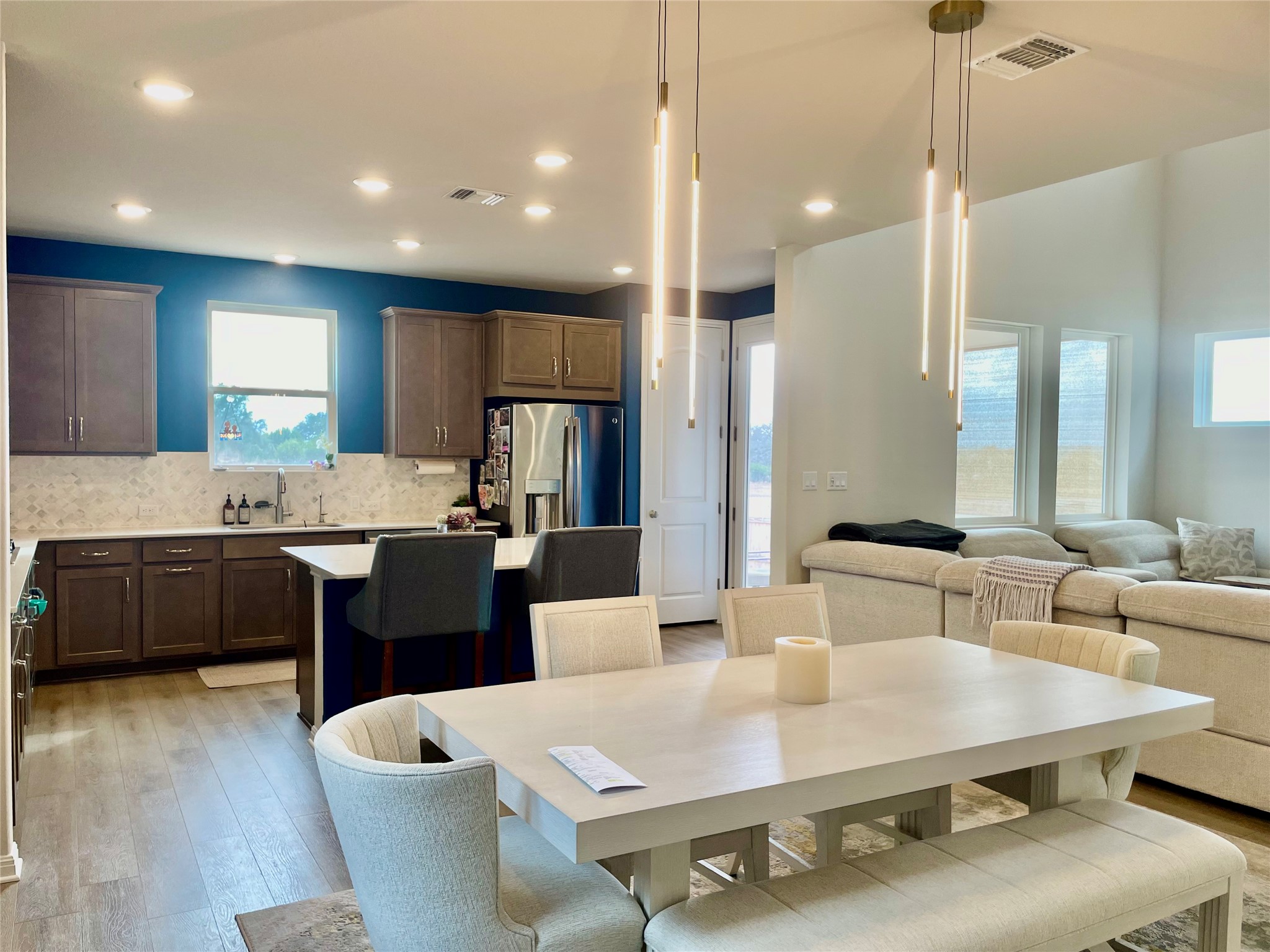 232 Denali Way Dripping Springs, TX 78620 - Photo 6 of 33 Dining area featuring light wood-style floors and recessed lighting
