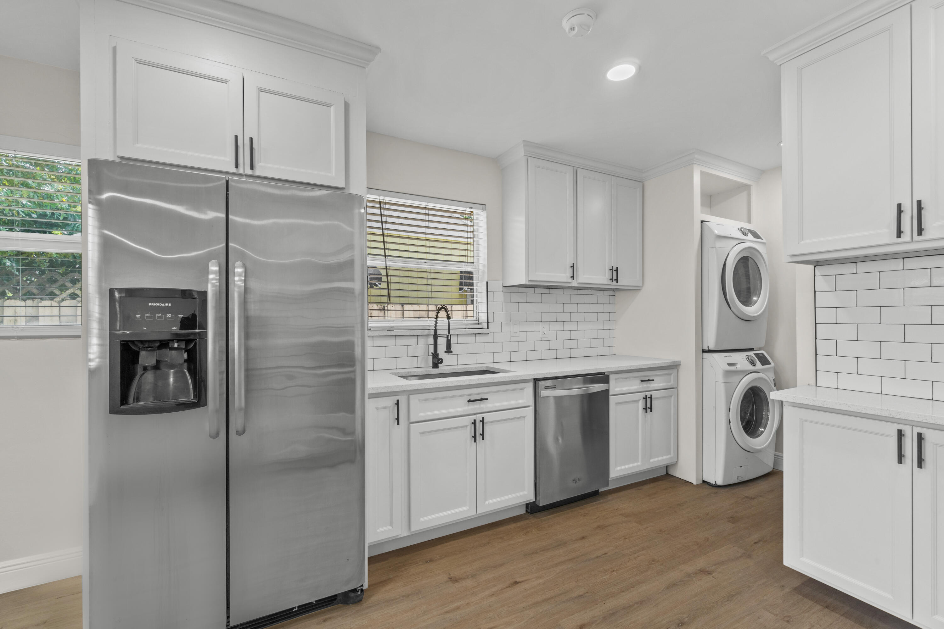 4882 Lincoln Road Delray Beach, FL 33445 - Photo 9 of 22 kitchen/laundry
