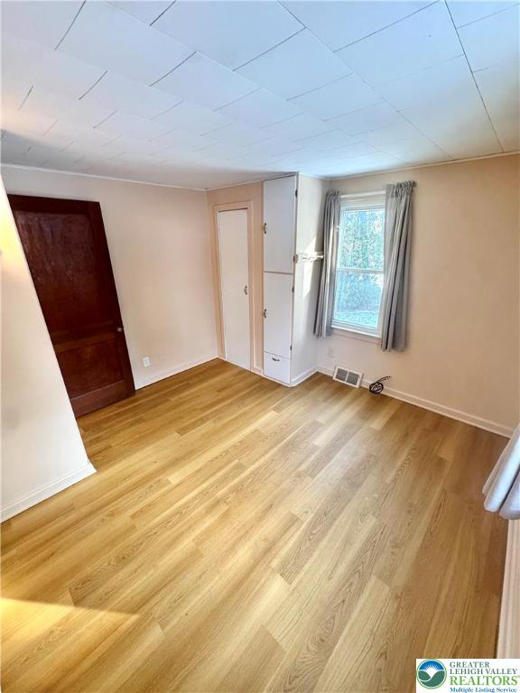 3210 Highway 309 Orefield, PA 18069 - Photo 13 of 17 a view of an empty room with wooden floor and a window