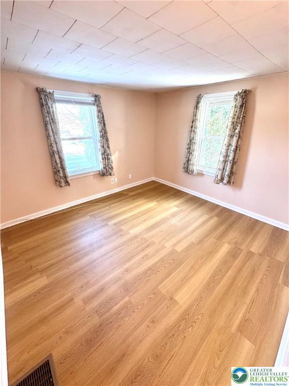 3210 Highway 309 Orefield, PA 18069 - Photo 9 of 17 a view of empty room with wooden floor and fan