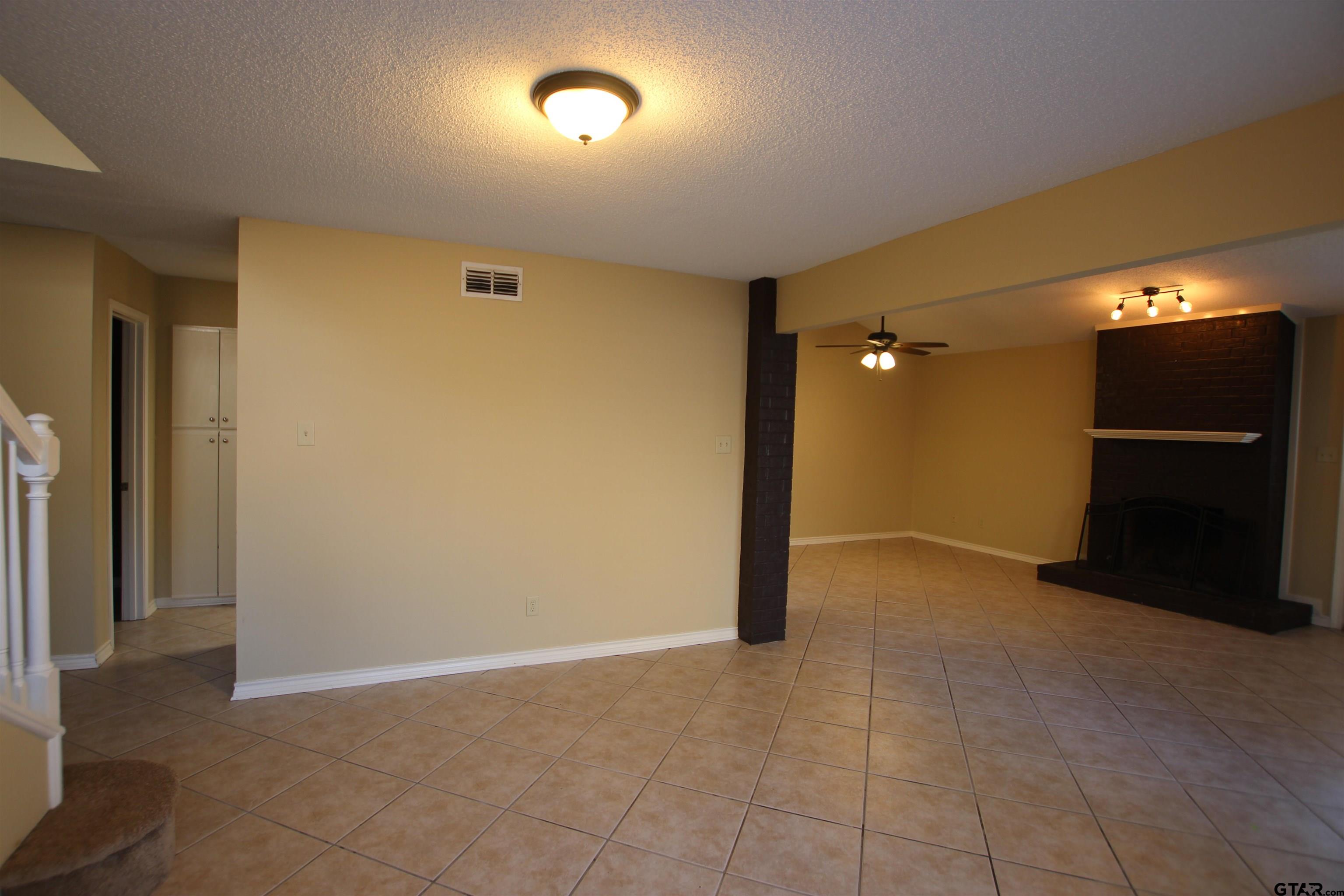 5875 Creekside Circle Tyler, TX 75703 - Photo 8 of 32 a view of an empty room