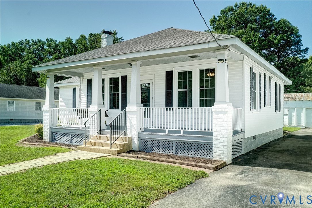 10024 Washington Road Glen Allen, VA 23060 - Photo 4 of 47 White exterior with black shutters and a covered f