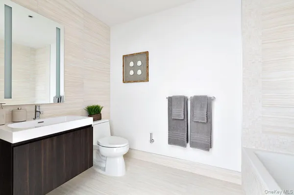 a bathroom with a sink and a toilet
