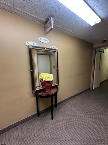 a view of room with a table and chairs