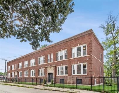 6601 South Green Street, Unit 8171 Chicago, IL 60621 - Photo 1 of 28 a front view of a building with garden