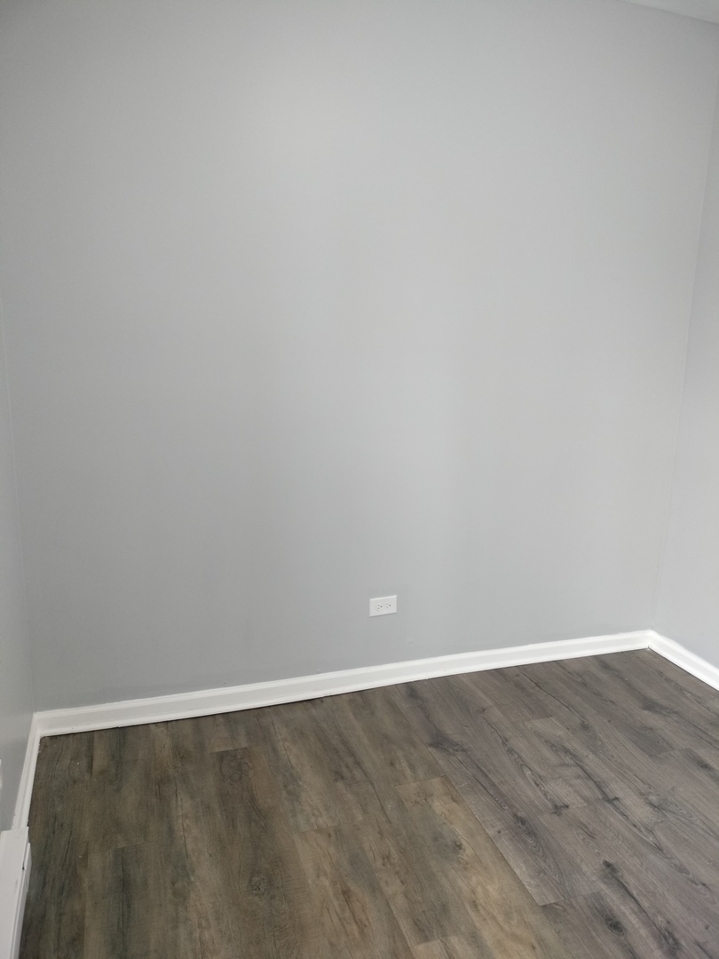 6601 South Green Street, Unit 8171 Chicago, IL 60621 - Photo 21 of 28 a view of an empty room