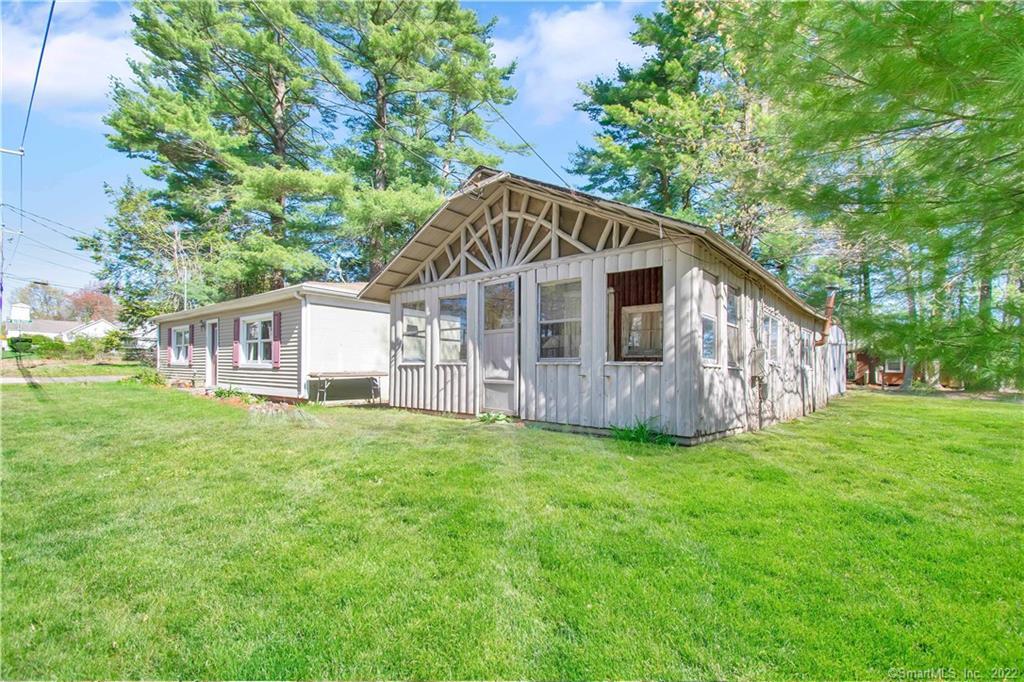 255 Sandy Beach Road Ellington, CT 06029 - Photo 1 of 1 a view of a house with a yard