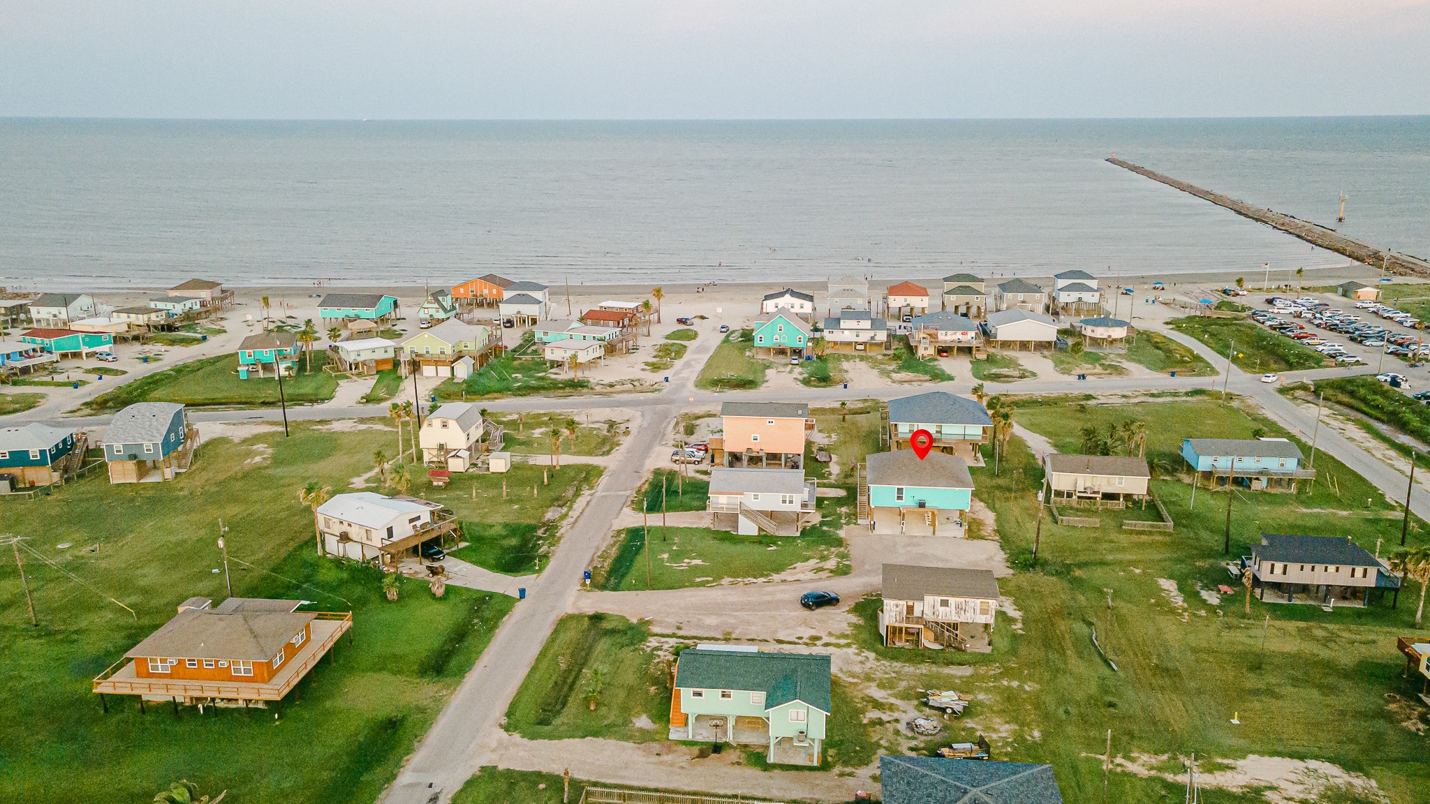 305 Jettyview Road, Unit A Surfside Beach, TX 77541 - Photo 23 of 41 an aerial view of multiple house