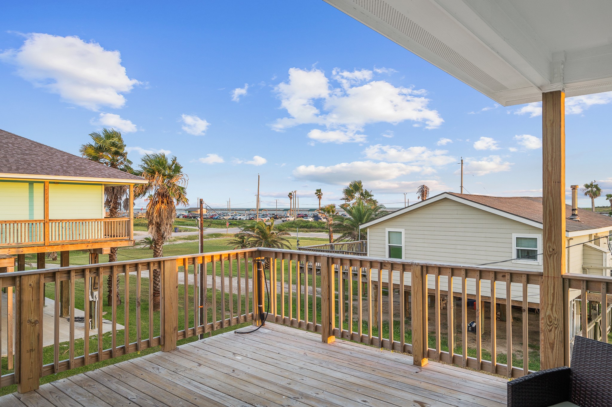 305 Jettyview Road, Unit A Surfside Beach, TX 77541 - Photo 30 of 41 a view of a house with a roof deck