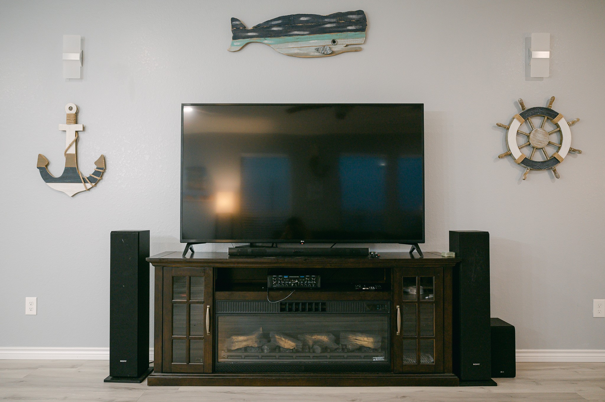 305 Jettyview Road, Unit A Surfside Beach, TX 77541 - Photo 6 of 41 a living room with furniture and a fireplace