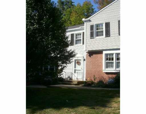 48 Tapping Reeve Village Litchfield, CT 06759 - Photo 1 of 1 a front view of a house with a garden