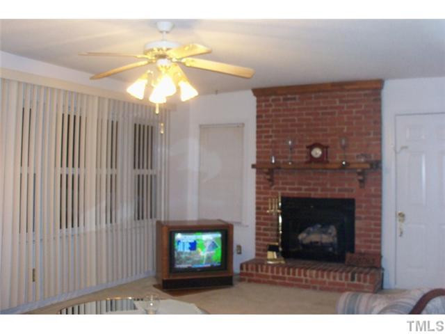 849 Cross Link Road Raleigh, NC 27610 - Photo 3 of 8 Living Room with Fireplace