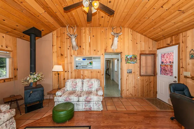 a kitchen with a refrigerator and window