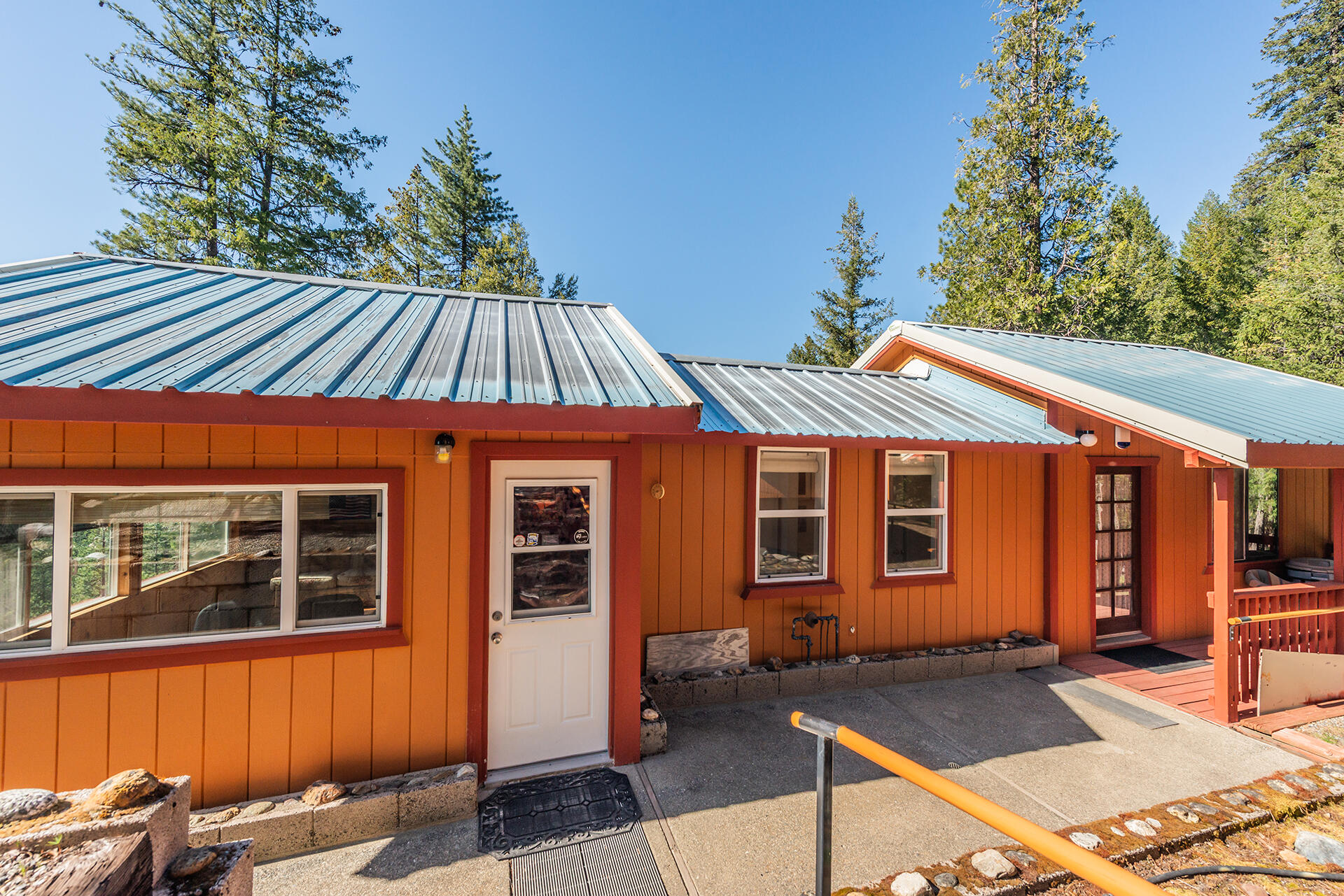 8341 East Side Road Trinity Center, CA 96091 - Photo 5 of 79 a front view of a house with a yard