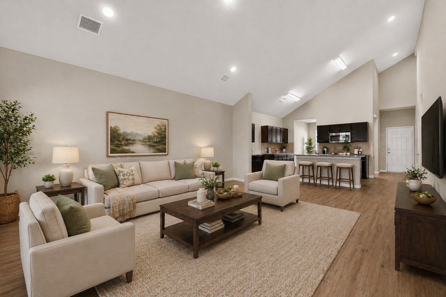 5905 Diamondleaf Bend Austin, TX 78724 - Photo 7 of 38 Open-concept living space featuring wood-finish flooring, recessed lighting, and a vaulted ceiling