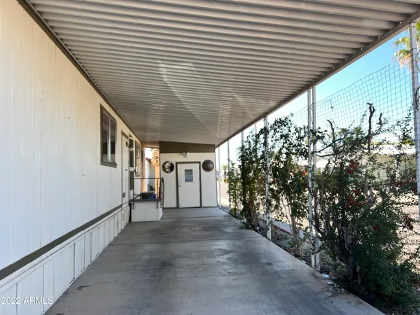 view of a house with a flower garden