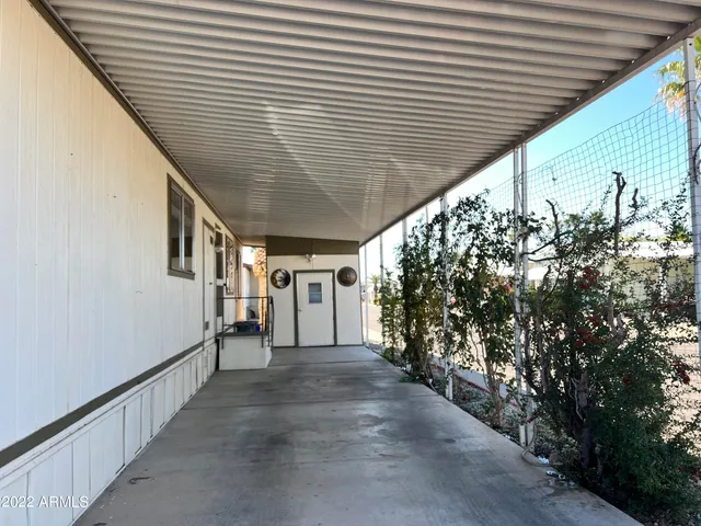 view of a house with a flower garden