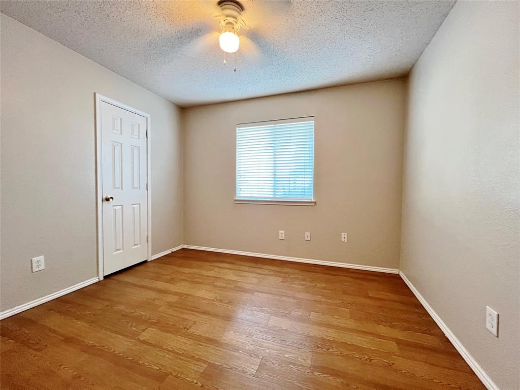 2217 Lookout Lane Denton, TX 76207 - Photo 12 of 18 an empty room with a window