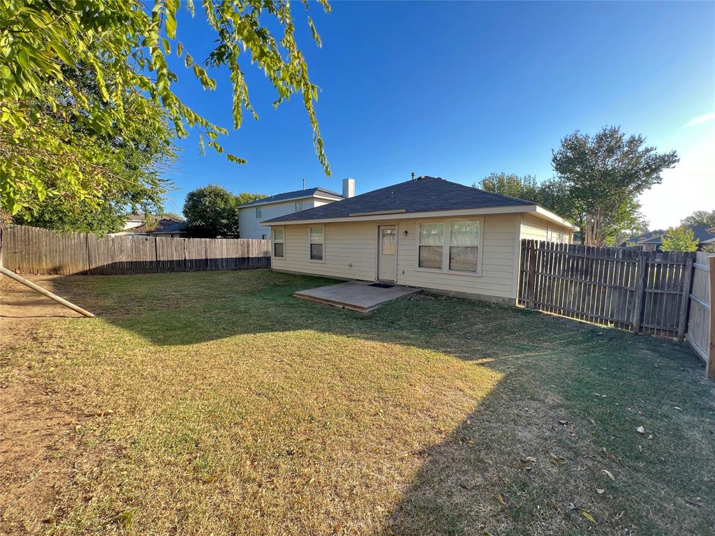 2217 Lookout Lane Denton, TX 76207 - Photo 18 of 18 a view of a house with a backyard