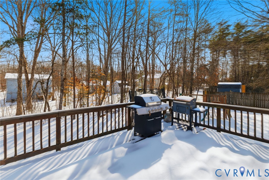 204 Village Court Ruther Glen, VA 22546 - Photo 19 of 27 a view of a chairs and tables in the balcony
