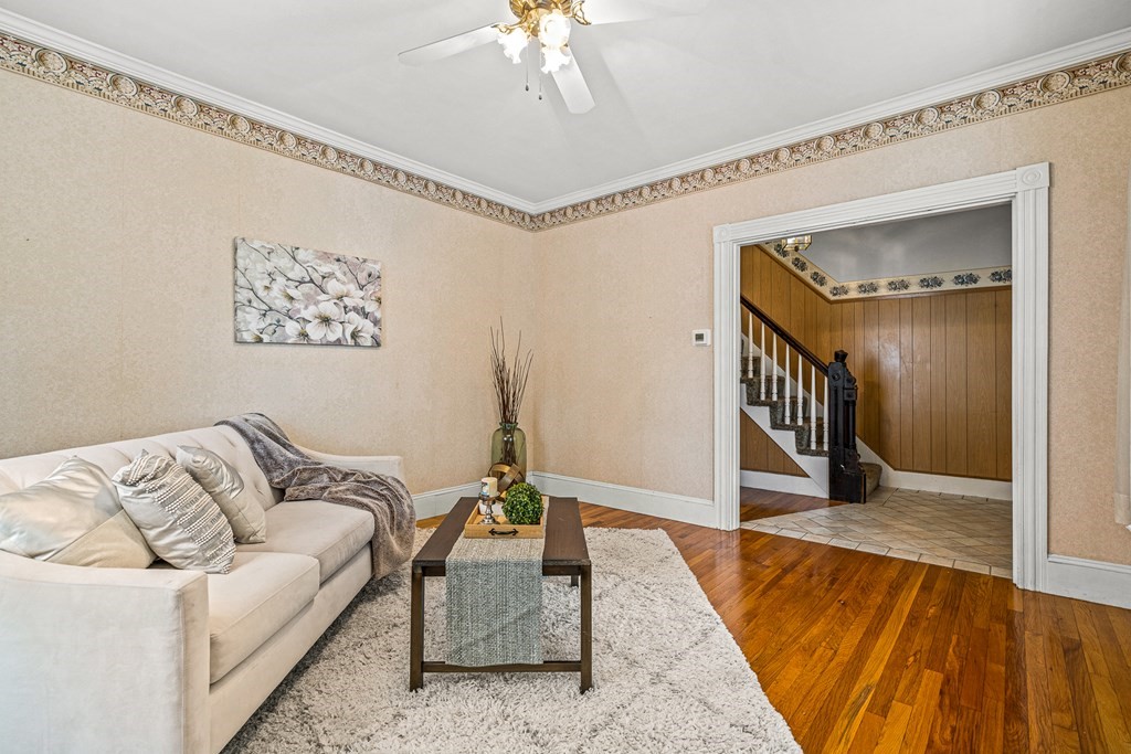 14 Hancock Street Stoneham, MA 02180 - Photo 13 of 38 a living room with furniture and a rug