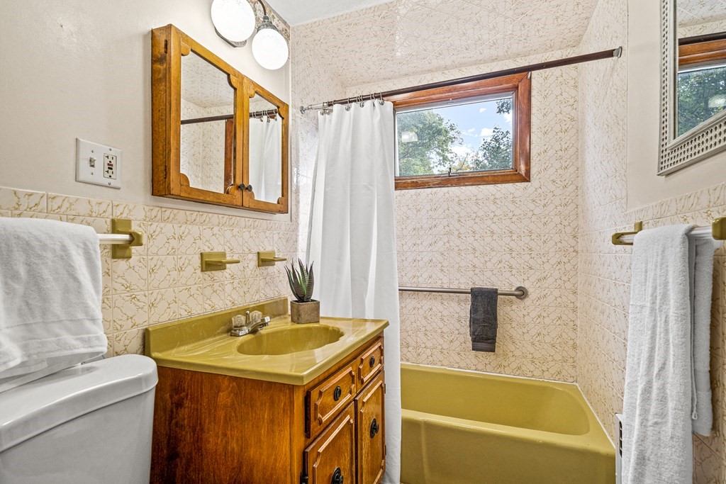14 Hancock Street Stoneham, MA 02180 - Photo 22 of 38 a bathroom with a sink and a bathtub