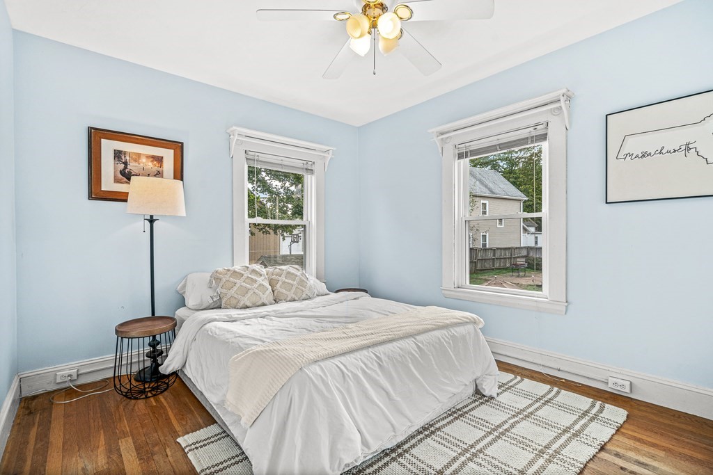 14 Hancock Street Stoneham, MA 02180 - Photo 23 of 38 a bedroom with a bed and a window