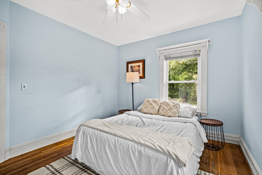14 Hancock Street Stoneham, MA 02180 - Photo 24 of 38 a bedroom with a bed and a window