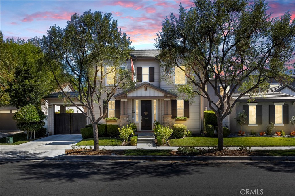28865 Edenton Way Temecula, CA 92591 - Photo 1 of 1 a front view of a house with a garden