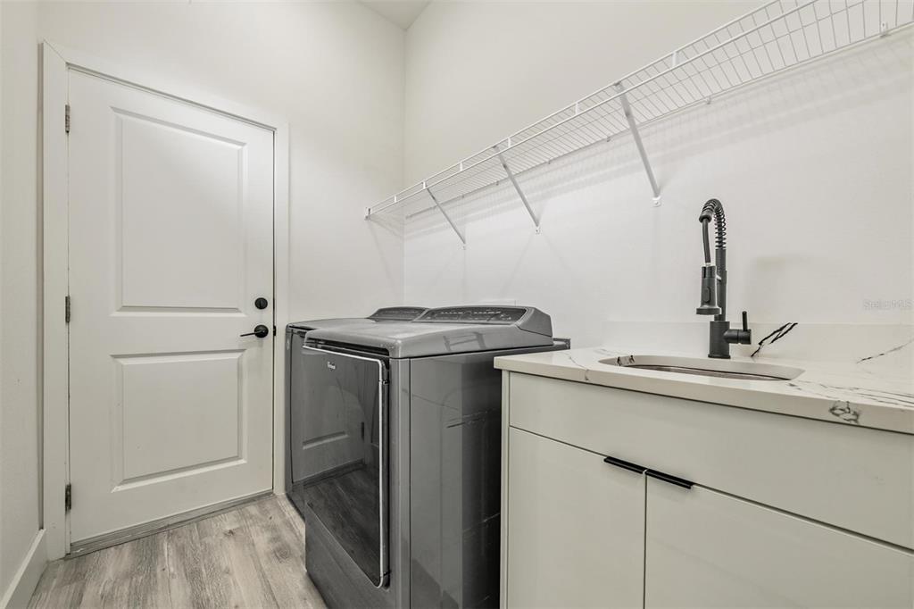 2305 West Kentucky Avenue Tampa, FL 33607 - Photo 22 of 26 a utility room with dryer and washer