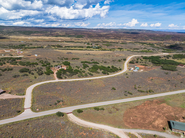 14 East Spring Draw Drive, Unit 13 La Sal, UT 84530 - Photo 9 of 17 Extensive undeveloped land with multiple paved and unpaved roads, surrounded by natural vegetation