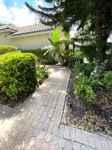 a view of a water pond with lots of green space