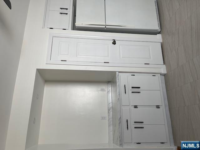 99 Union Avenue, Unit 2 Garfield, NJ 07026 - Photo 7 of 14 a view of cabinets with wooden floor