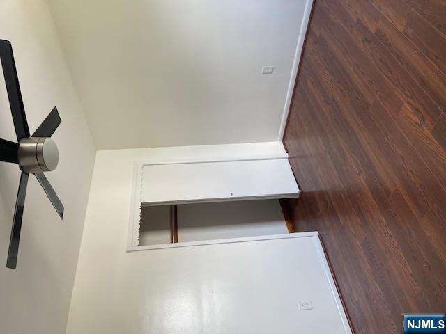 99 Union Avenue, Unit 2 Garfield, NJ 07026 - Photo 8 of 14 a view of an empty room with wooden floor